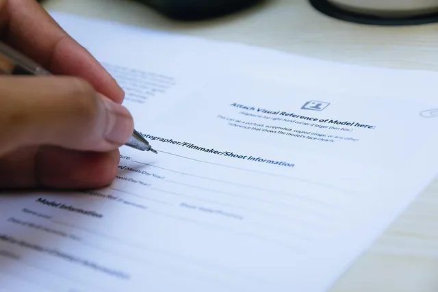 signing, paper, hand, close up, document, writing, pen, office, business, agreement, contract, paper, agreement, agreement, agreement, contract, contract, contract, contract, contract. Talent management: piloting AI without the pilot trap