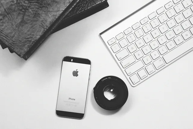 iphone, smartphone, mobile, technology, keyboard, business, creative, office, desk, lens, black and white, notebooks. Talent management channel strategy for UK agencies