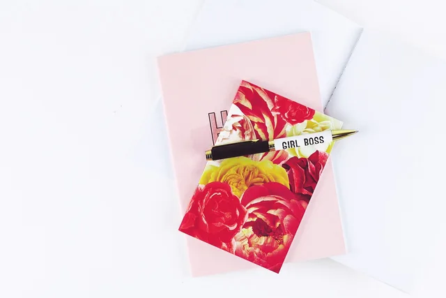 notebook, pen, white desk, girl boss, girl boss, girl boss, girl boss, girl boss, girl boss. Influencer management agency roles and data sources
